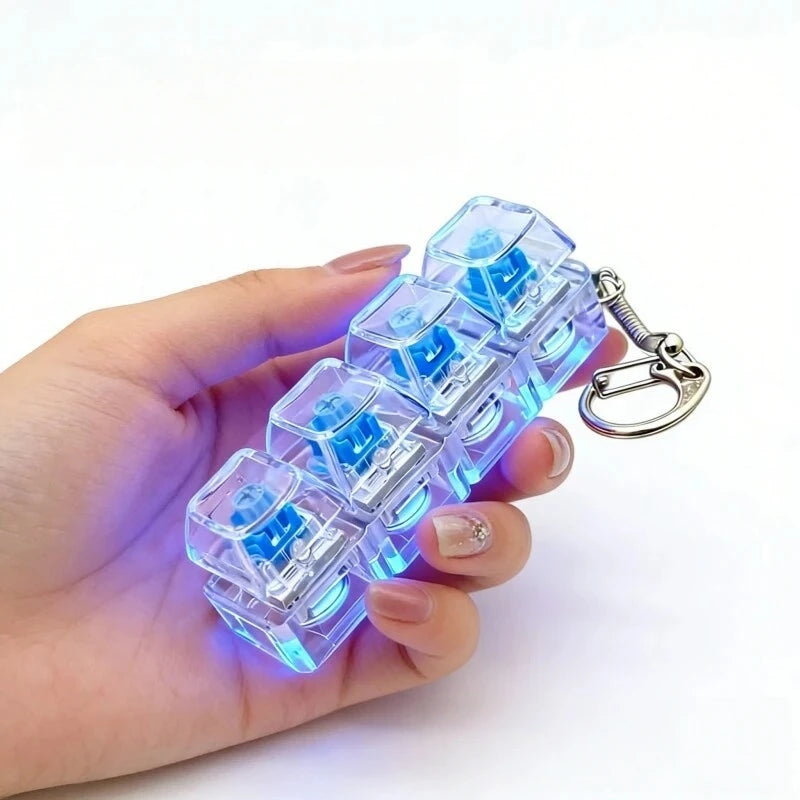 Illuminated mechanical fidget keychain with blue LED lights, held in hand