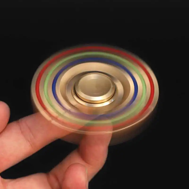 Six-arm metal fidget spinner for sensory focus and ADHD stress relief spinning on one finger, showcasing its balance