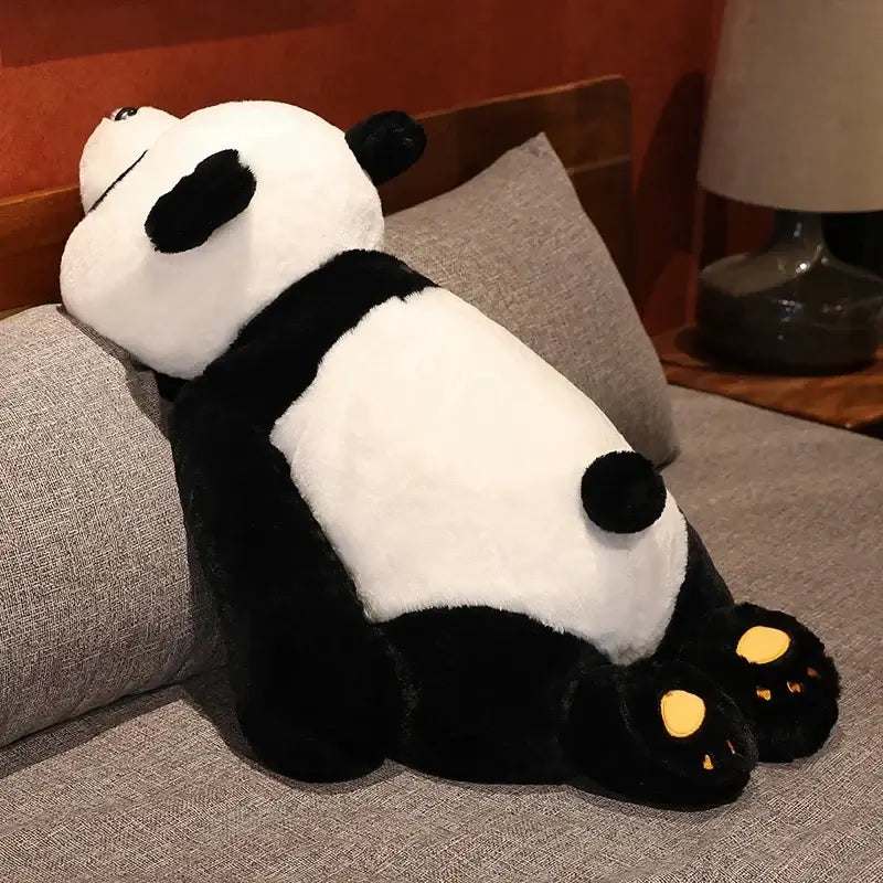 Giant Weighted Panda Plush – Soft Comfort Toy resting on a sofa, perfect for cuddles and calming moments, sensory toys Ireland.