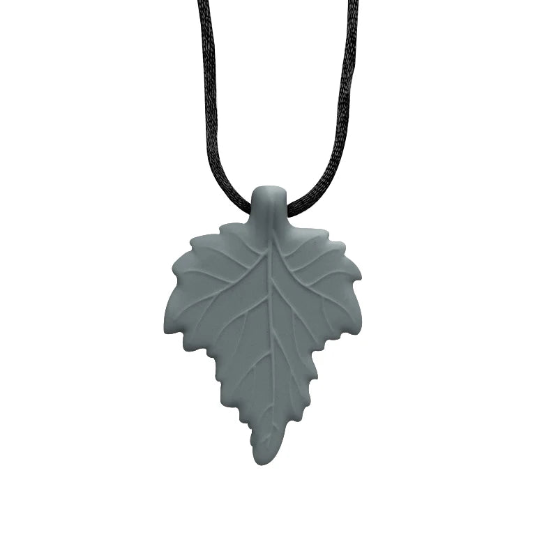 Gray leaf-shaped pendant on a black cord against a white background