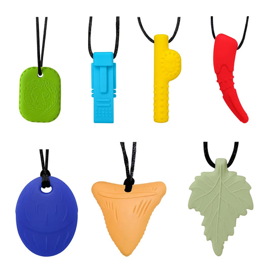 Colorful silicone necklaces on a white background