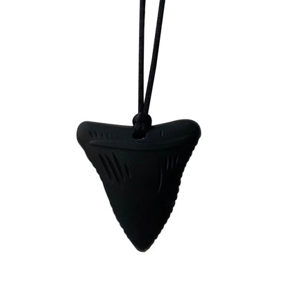 Black shark fin-shaped pendant on a white background