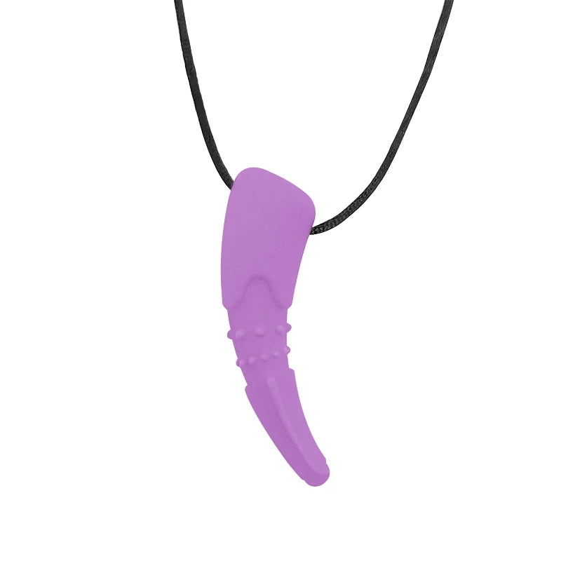 Purple shark tooth pendant on a black cord against a white background