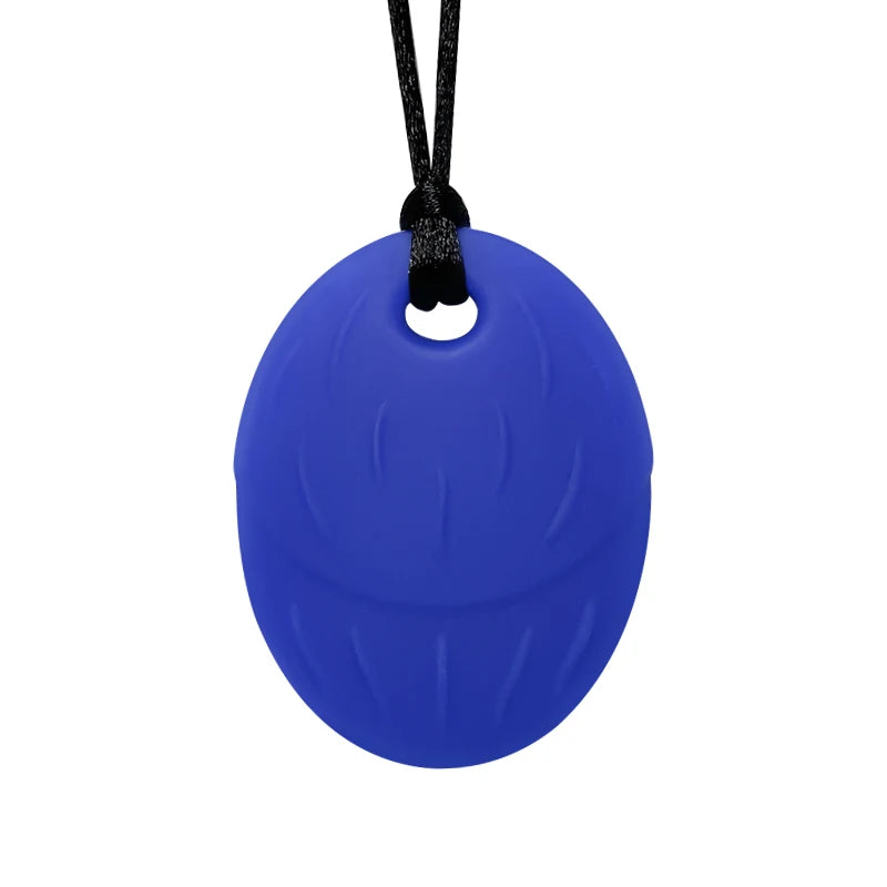 Blue pendant on a black cord against a white background