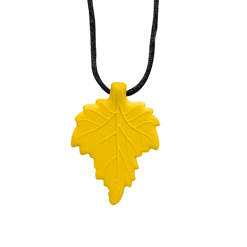 Yellow leaf-shaped pendant on a black cord against a white background