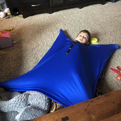 Child enjoying the Sensory Compression Body Sock for Kids, providing calming sensory play and movement.