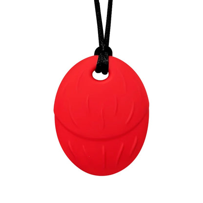 Red silicone pendant on a black cord against a white background