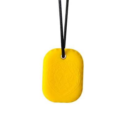 Yellow square pendant with a black cord on a white background