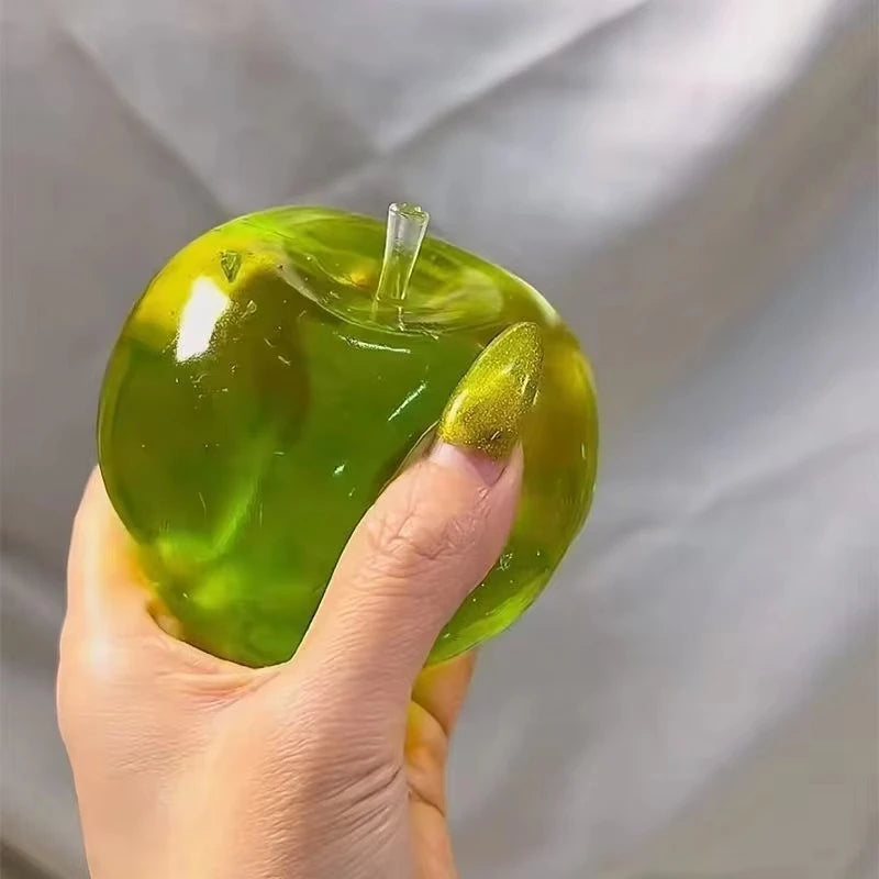 Green apple squeeze toy for stress relief and sensory stimulation left side