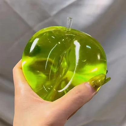Green apple squeeze toy for stress relief and sensory stimulation detail