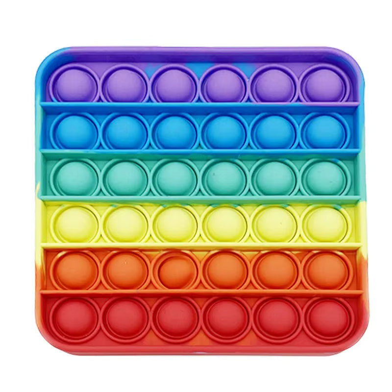 Rainbow Pop-It Fidget Toy — Assorted Shapes in vibrant rainbow colors, perfect sensory toy for stress relief in Ireland.