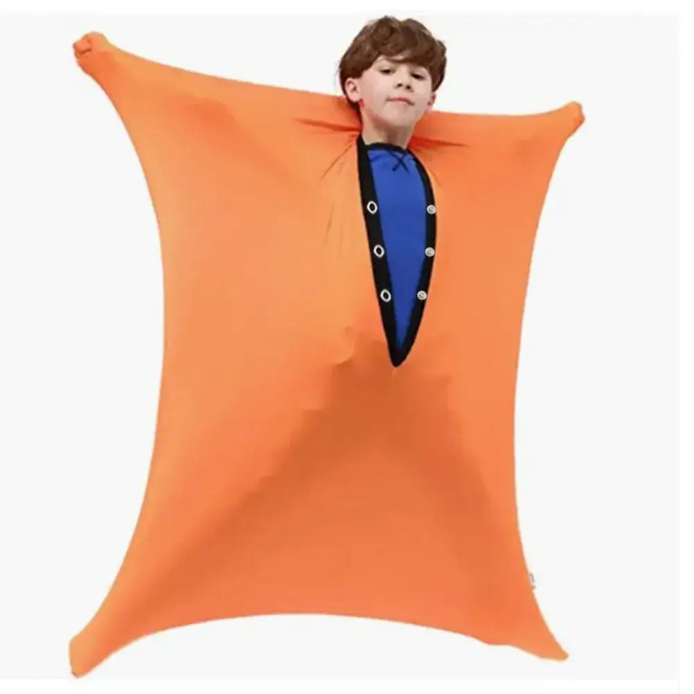 Child in an orange Sensory Compression Body Sock for Kids, perfect sensory toys Ireland for movement and calming activities.