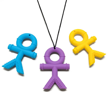 three  colorful chewelry necklaces for autism taken from a bird's eye perspective